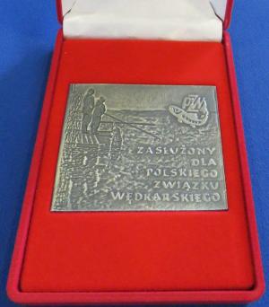Odznaka „Zasłużony dla Polskiego Związku Wędkarskiego”.