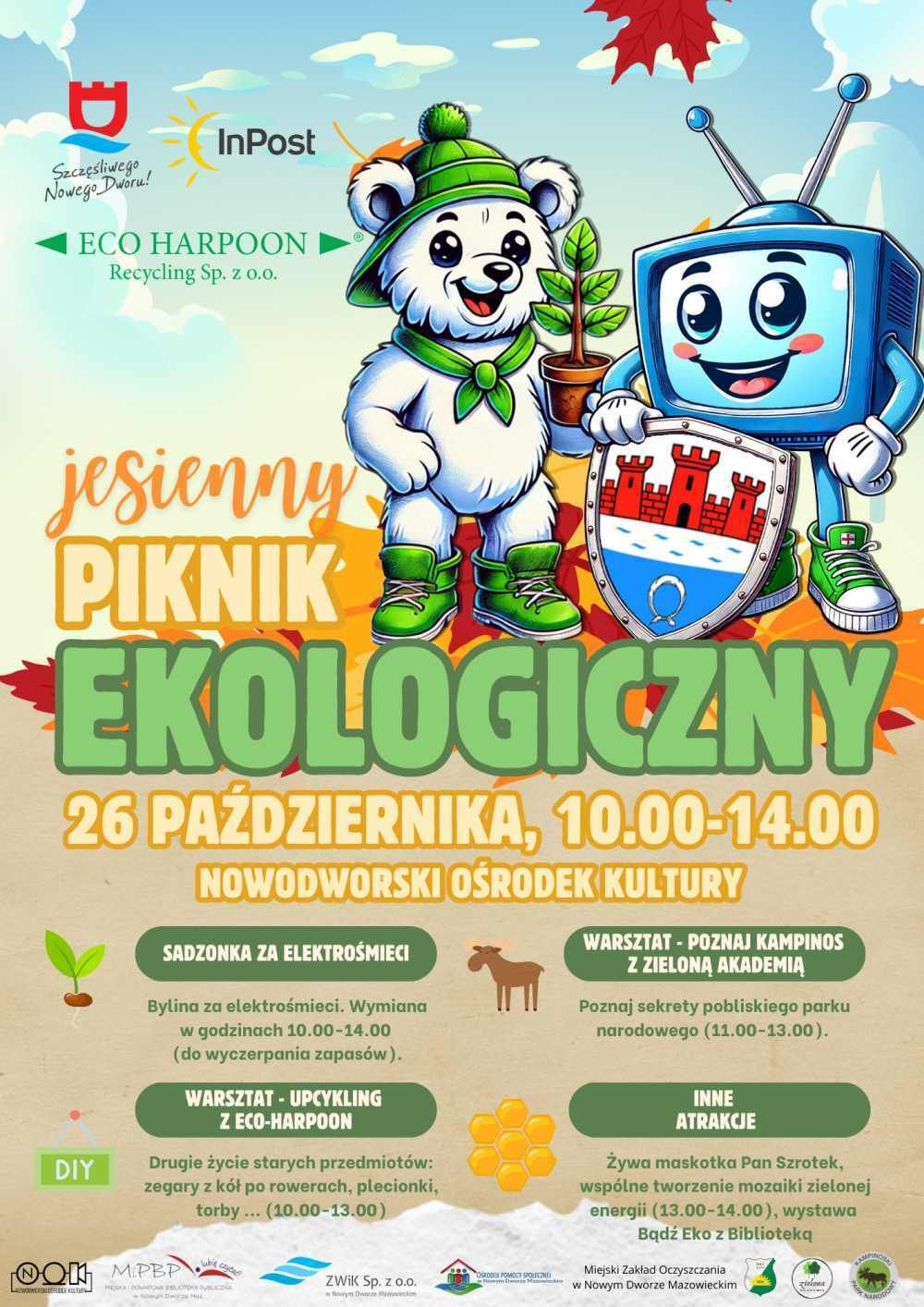 Biały miś w zielonej czapce i butach trzyma roślinkę w doniczce. Obok niebieski telewizor z tarczą z herbem miasta.