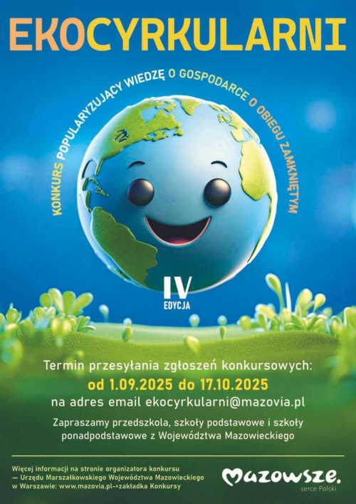 Uśmiechnięta kula ziemska nad zieloną łąką.