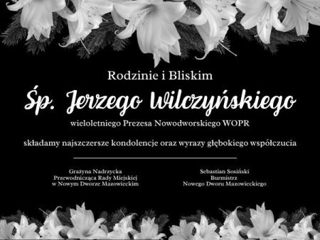 czarne tło, białe lilie i biały tekst