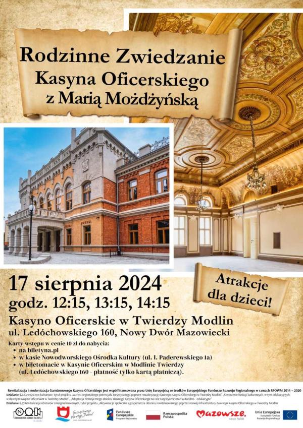 Biała ozdobna elewacja zabytkowego budynku z czerwonej cegły. Ozdobny sufit i ściany w dużej sali.