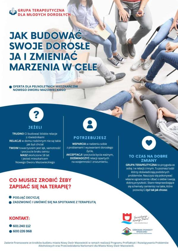 Grupa siedmiu osób siedzący w okręgu.