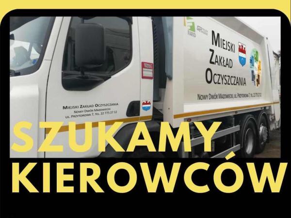 Biała śmieciarka z napisem Miejski Zakład Oczyszczania.