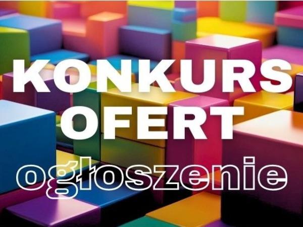 Kolorowe klocki w tle, na pierwszym planie biały napis konkurs ofert